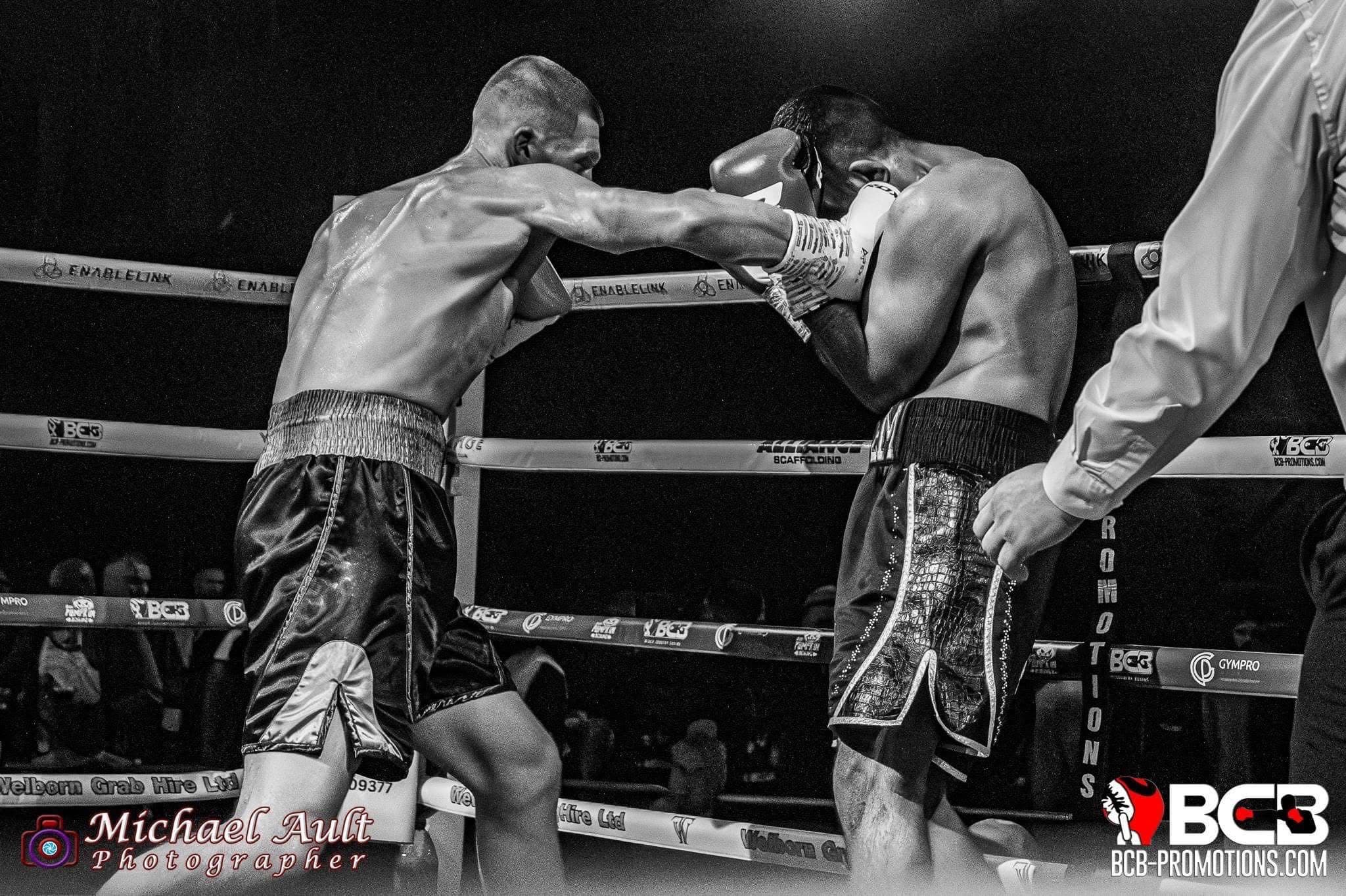 Boxing bout action in the ring