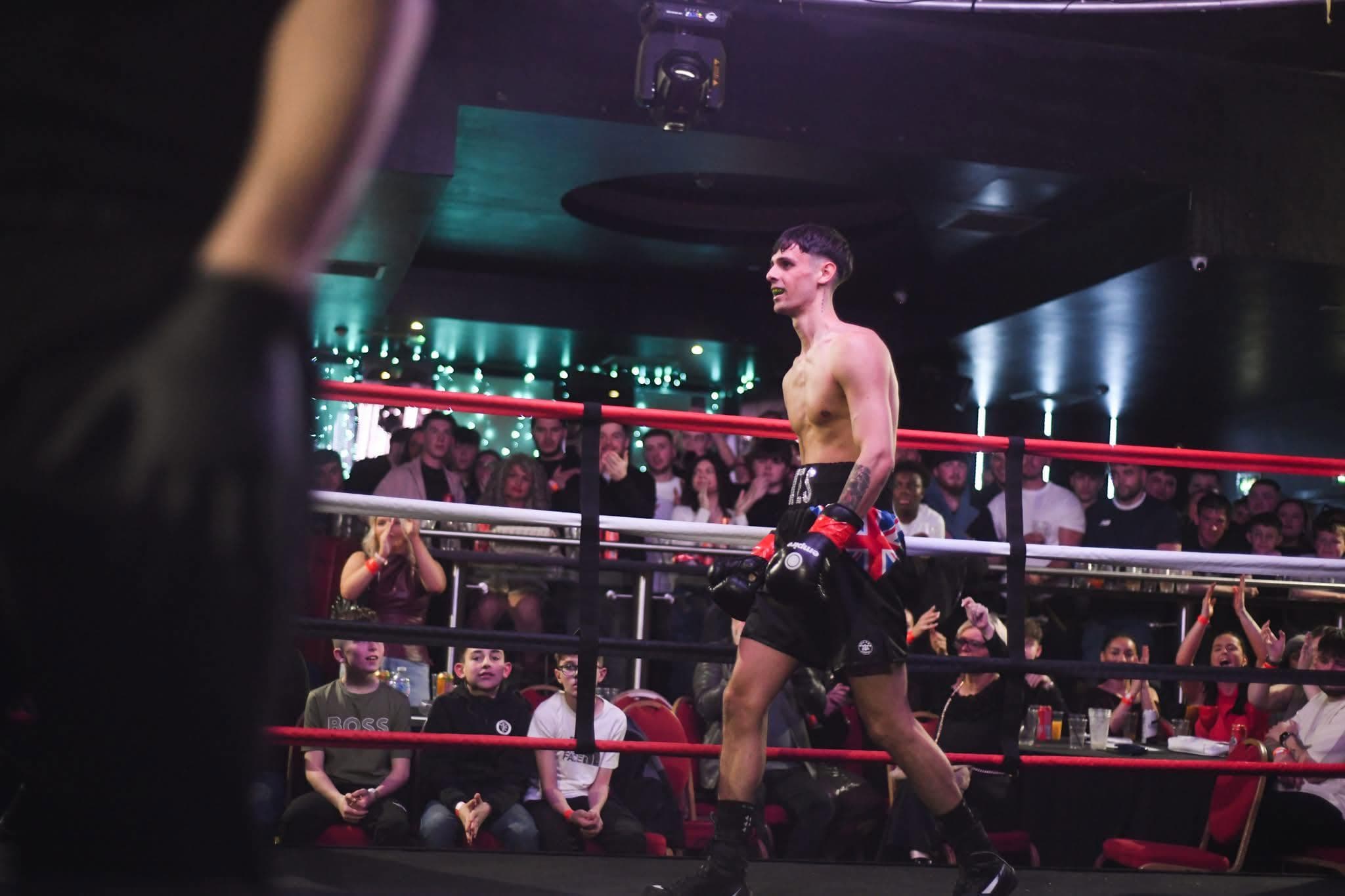 Fighter walking through the ring after a bout