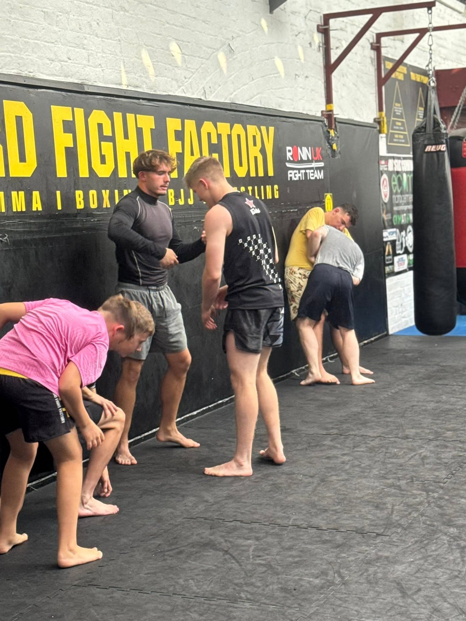 Class training inside Stafford Fight Factory