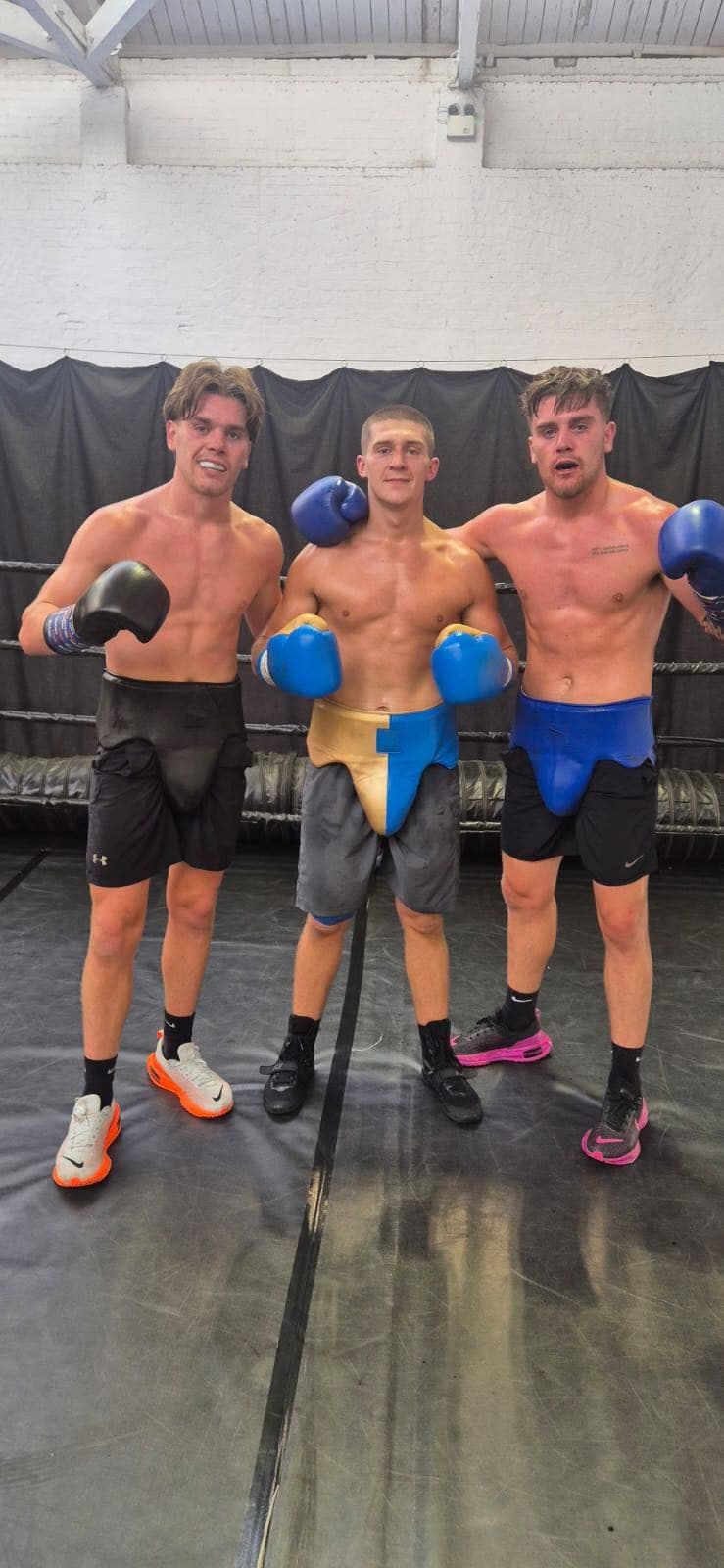 Fighters posing after training