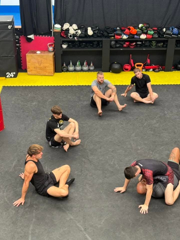 Group training session on the mats